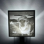 Framed artwork of a dog wearing a cap with 'EDV' on a light gray background