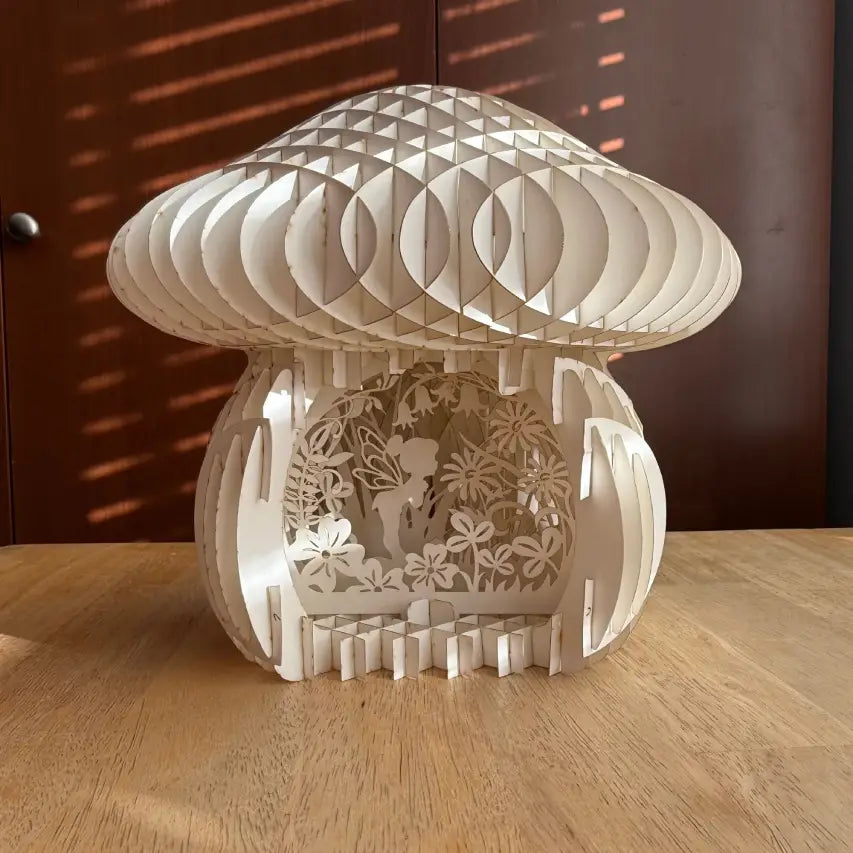 papercut fairy lantern on a wood table