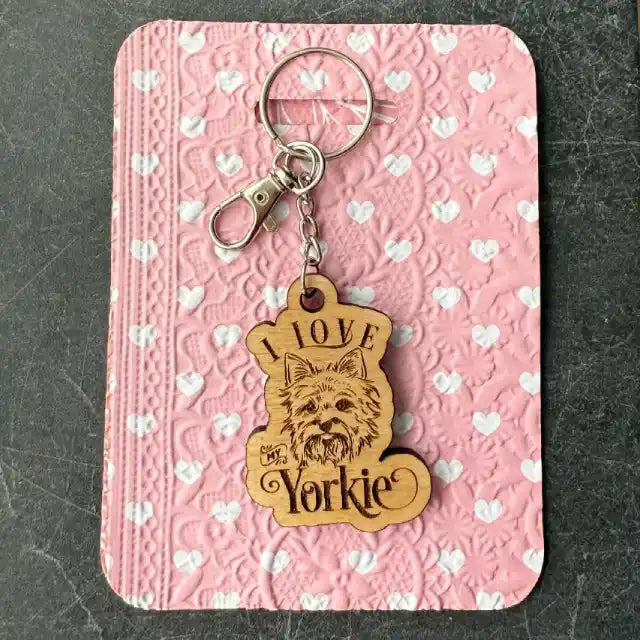 Keychain with 'Love Yorkie' tag on a pink card with heart pattern